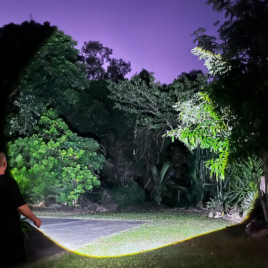 titan-range-tf23-torch-beam-lighting-up-bushland-scene-night-test