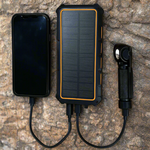 Titan PB36 power bank connected to a torch and phone